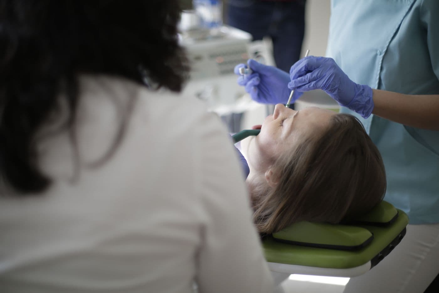 Dentist performing a gentle treatment
